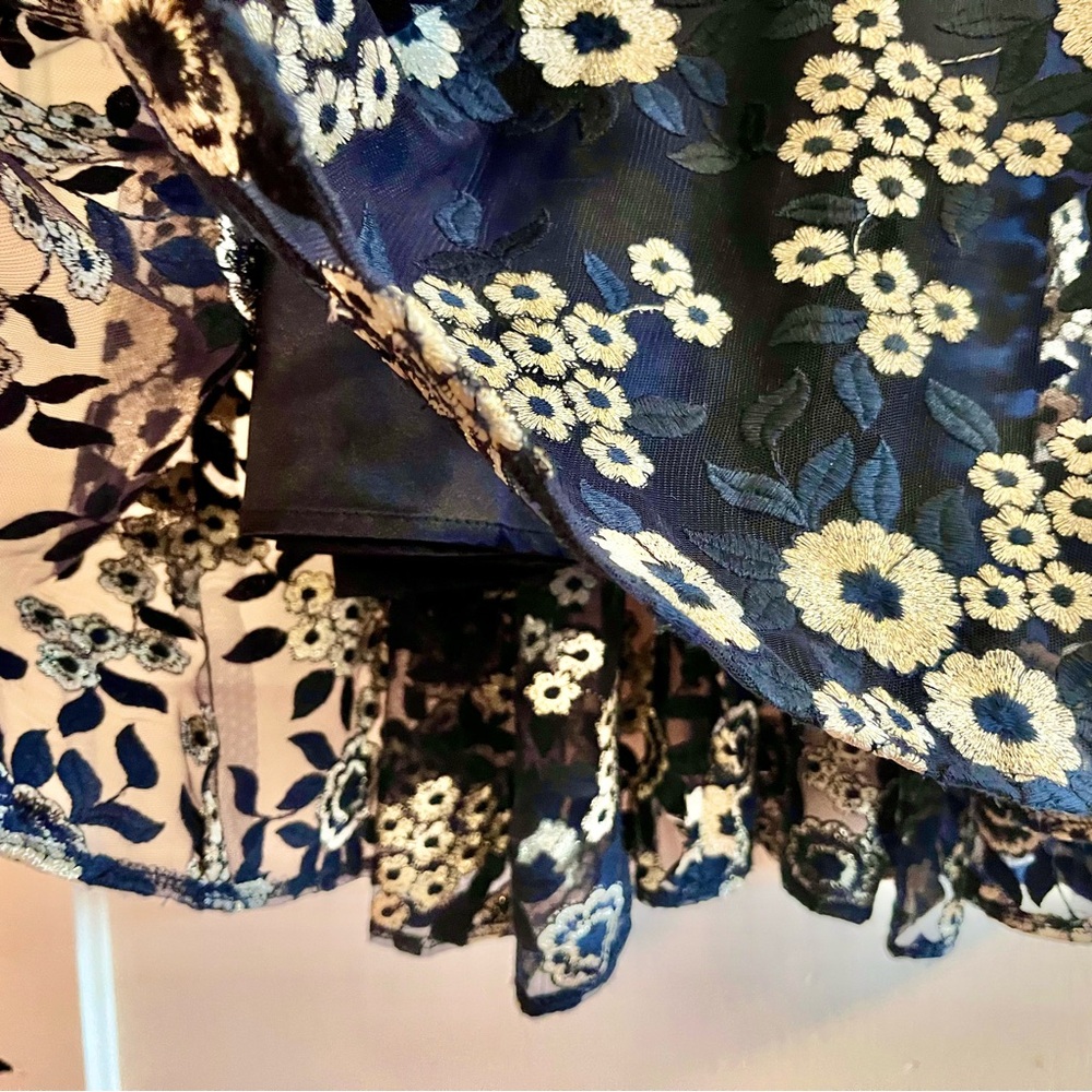 Tahari Elegant Sleeveless Dress with White Floral Embroidery over Deep Blue - Picture 4 of 14